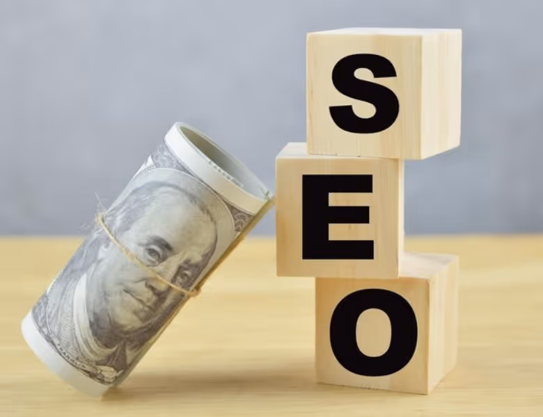 a roll of american currency with SEO blocks